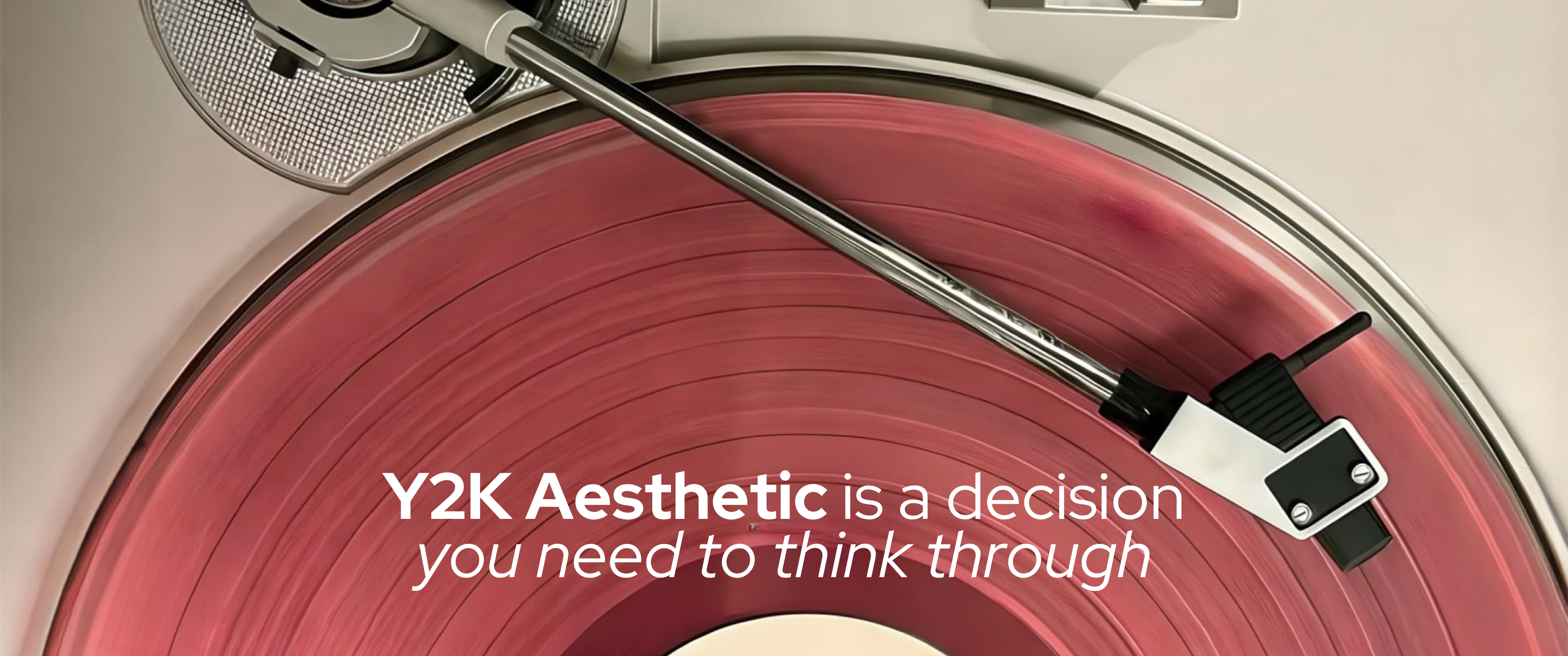 Blog header featuring a close-up of a vintage record player with a pink vinyl record spinning beneath a silver tonearm. Overlaid text reads, “Y2K Aesthetic is a decision you need to think through,” highlighting the resurgence of retro design trends with a nostalgic early-2000s visual style.